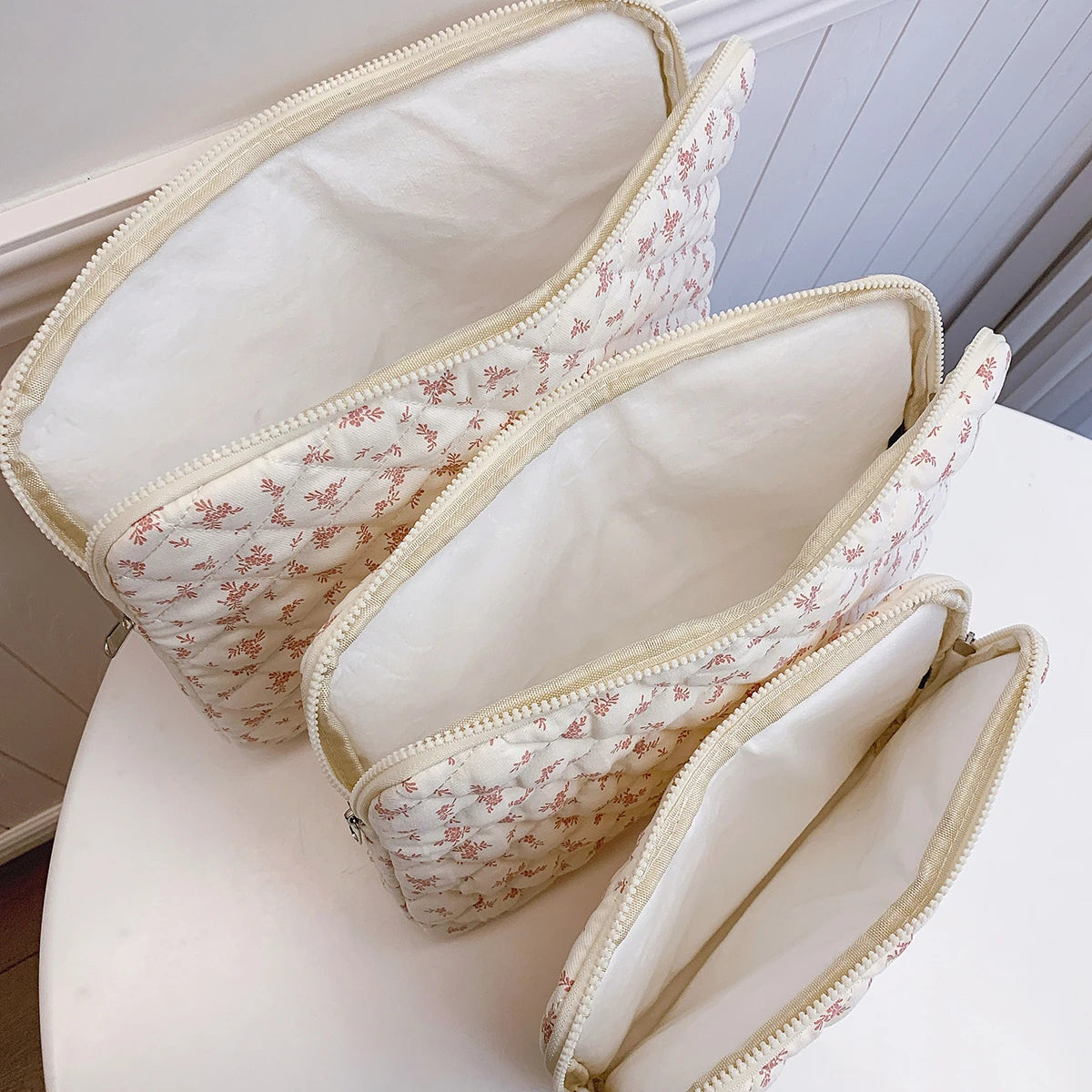 Sac pour ordinateur portable matelassé à imprimé floral