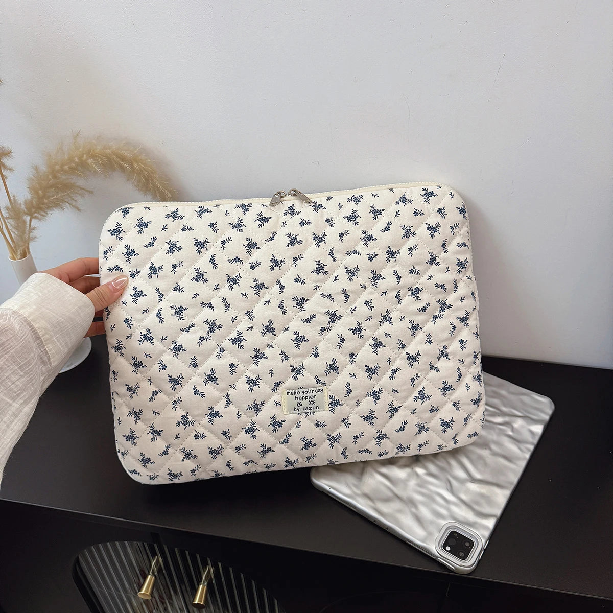 Sac pour ordinateur portable matelassé à imprimé floral