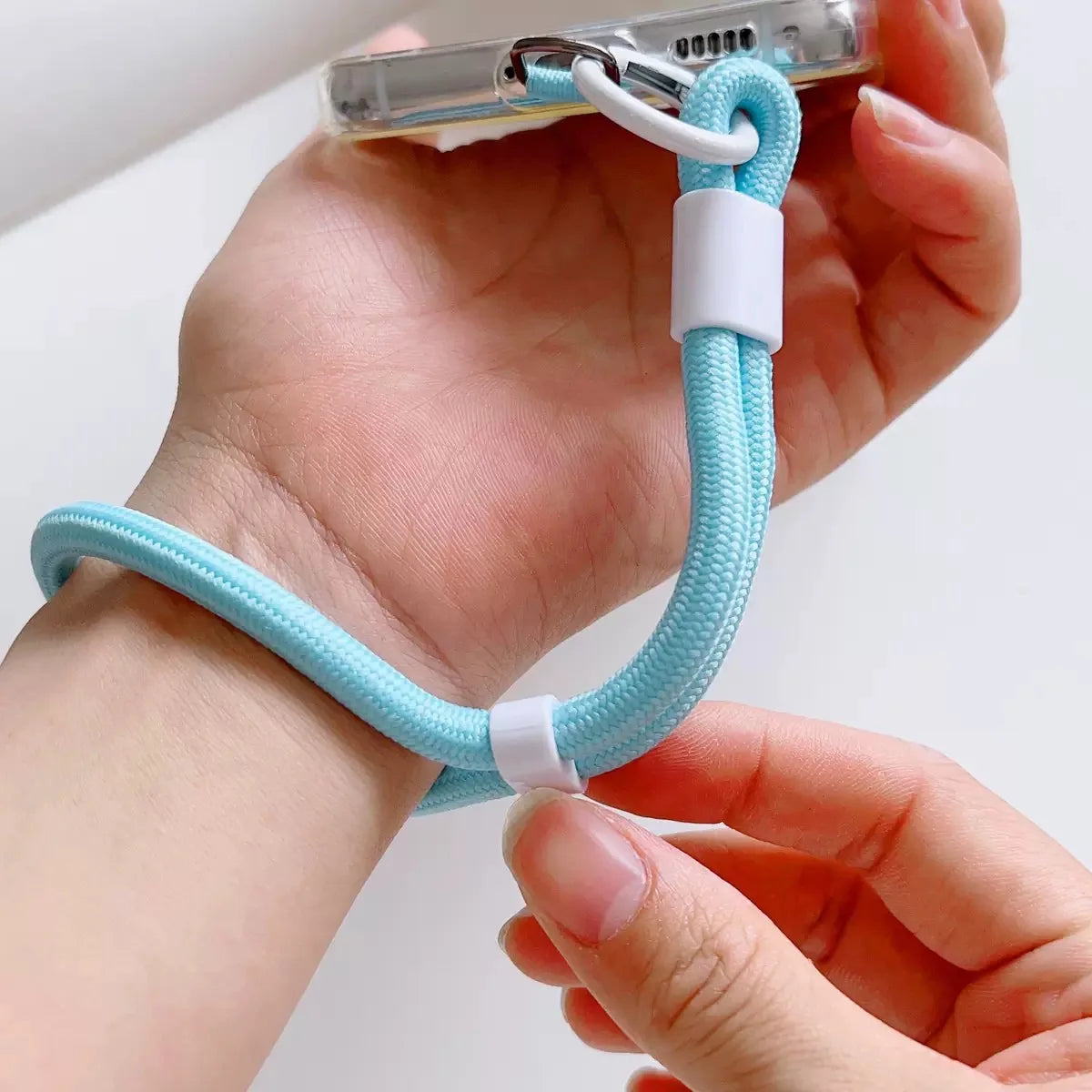 Adjustable mobile phone lanyard with anti-drop system